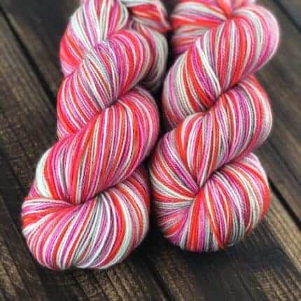 Yarn with red, white and purple stripes.