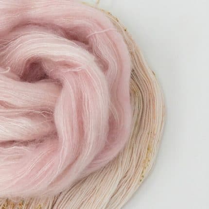 Pink mohair silk yarn paired with a beige yarn