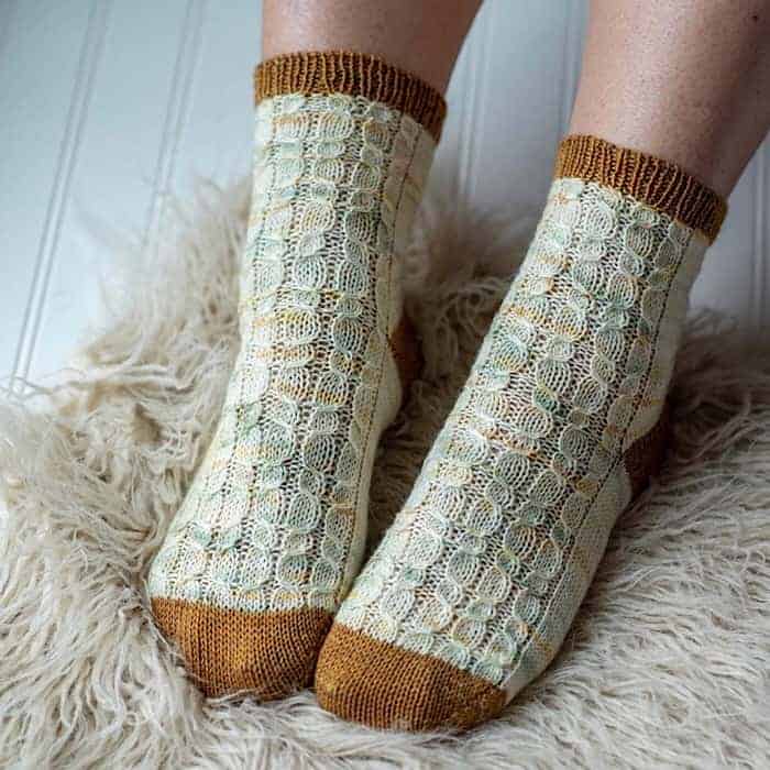 Cream speckled and gold socks. 