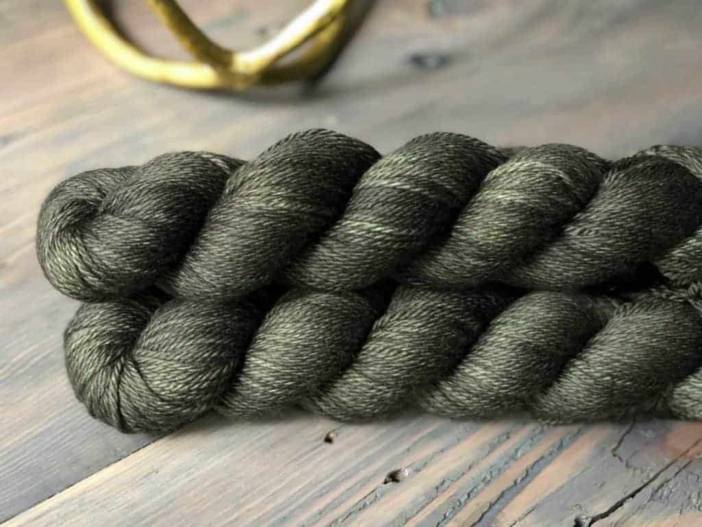 A skein of olive green yarn