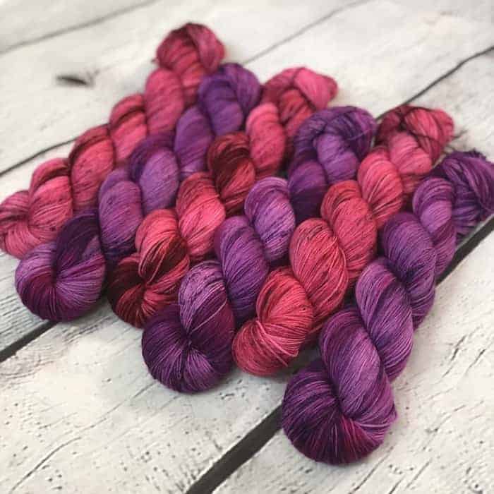 Pink and purple skeins of yarn