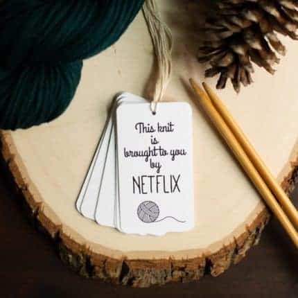 A gift tag that reads "This gift is brought to you by Netflix."