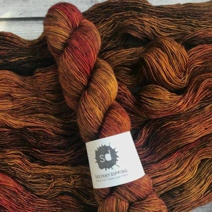 Brown and orange single-ply yarn.