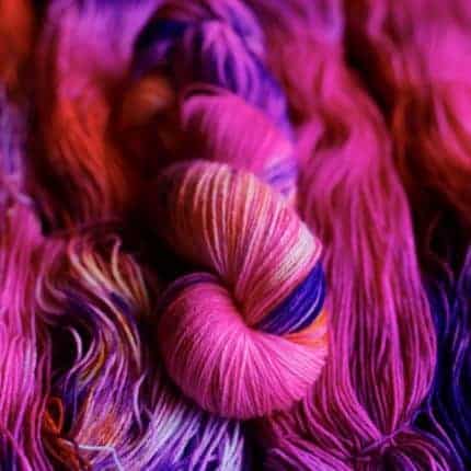 Fuchsia and purple yarn.