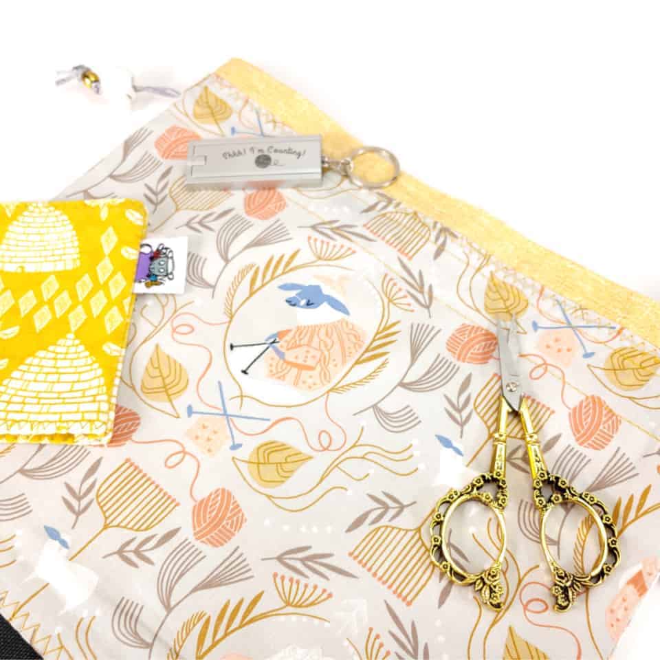 A bag in yellow and orange floral fabric.