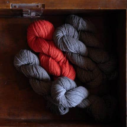 Gray and red yarn.