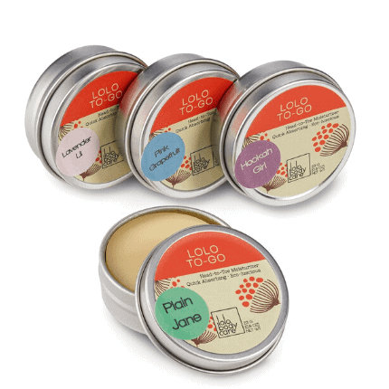 Silver tins with an orange and cream label.