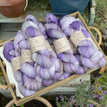A pile of purple sock yarn.