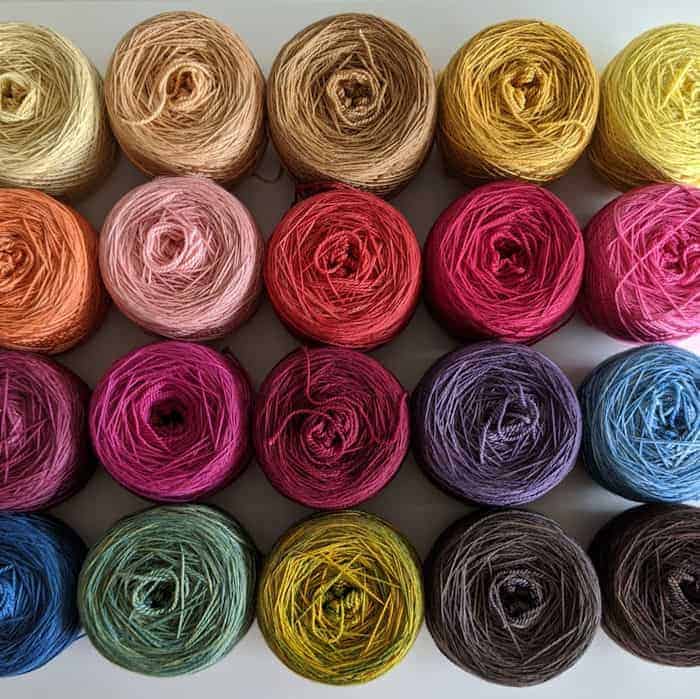 Rows of rainbow colored yarn.