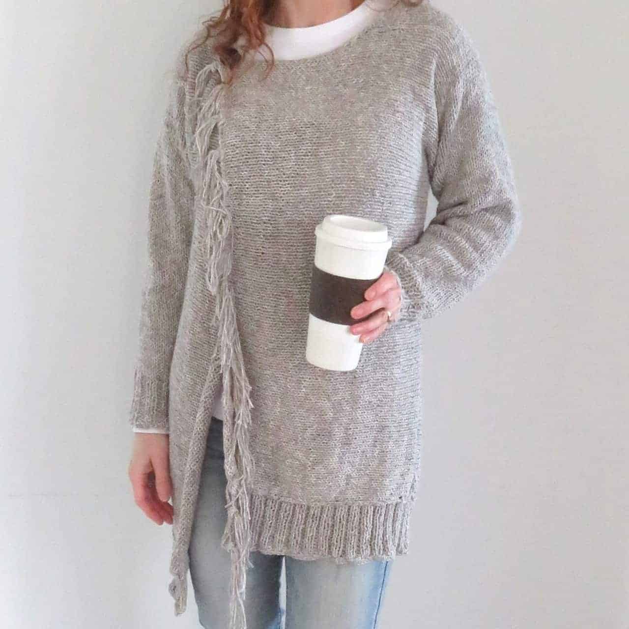 A long taupe cardigan.