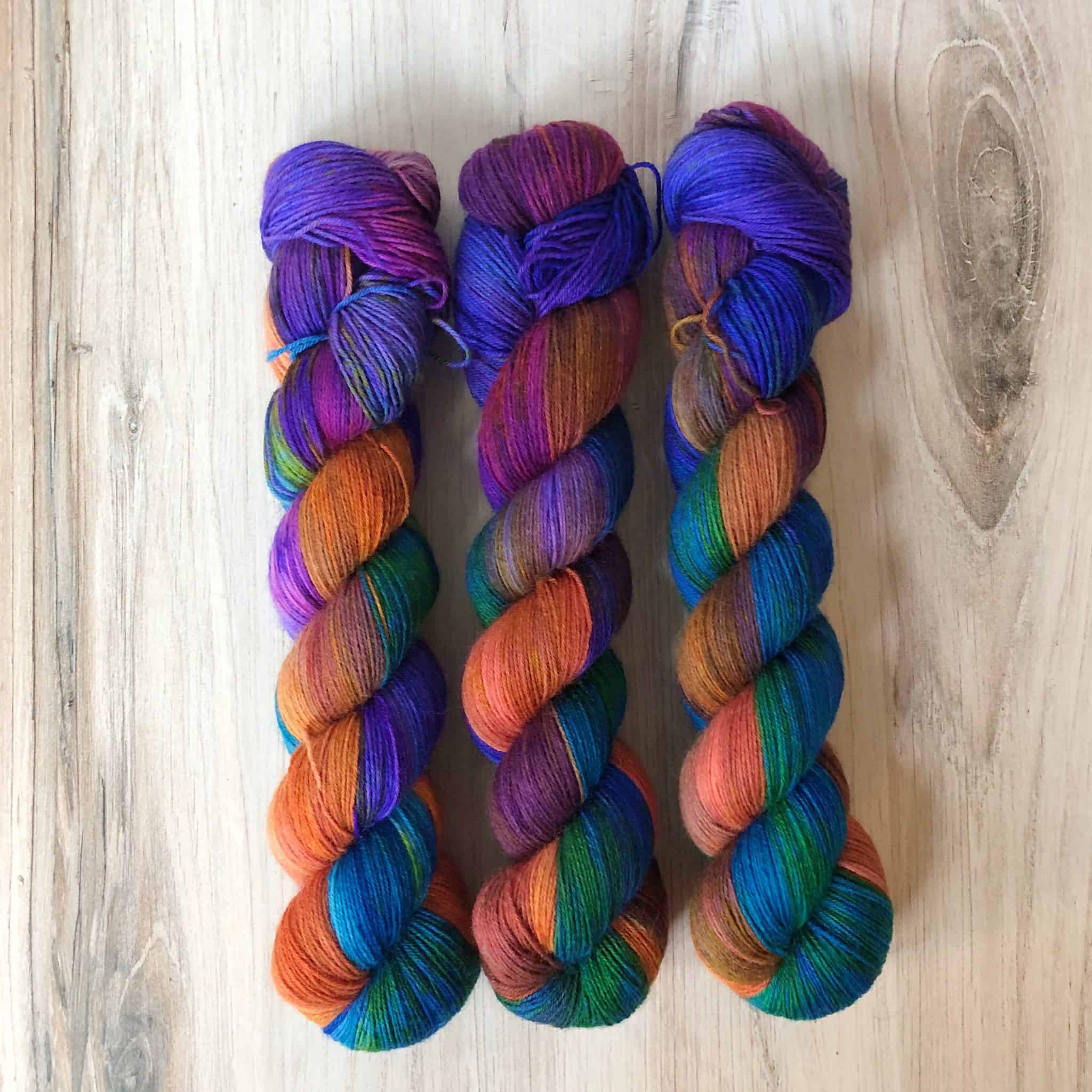 Green, orange, purple and blue variegated yarn.