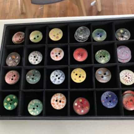 A box of colorful buttons.