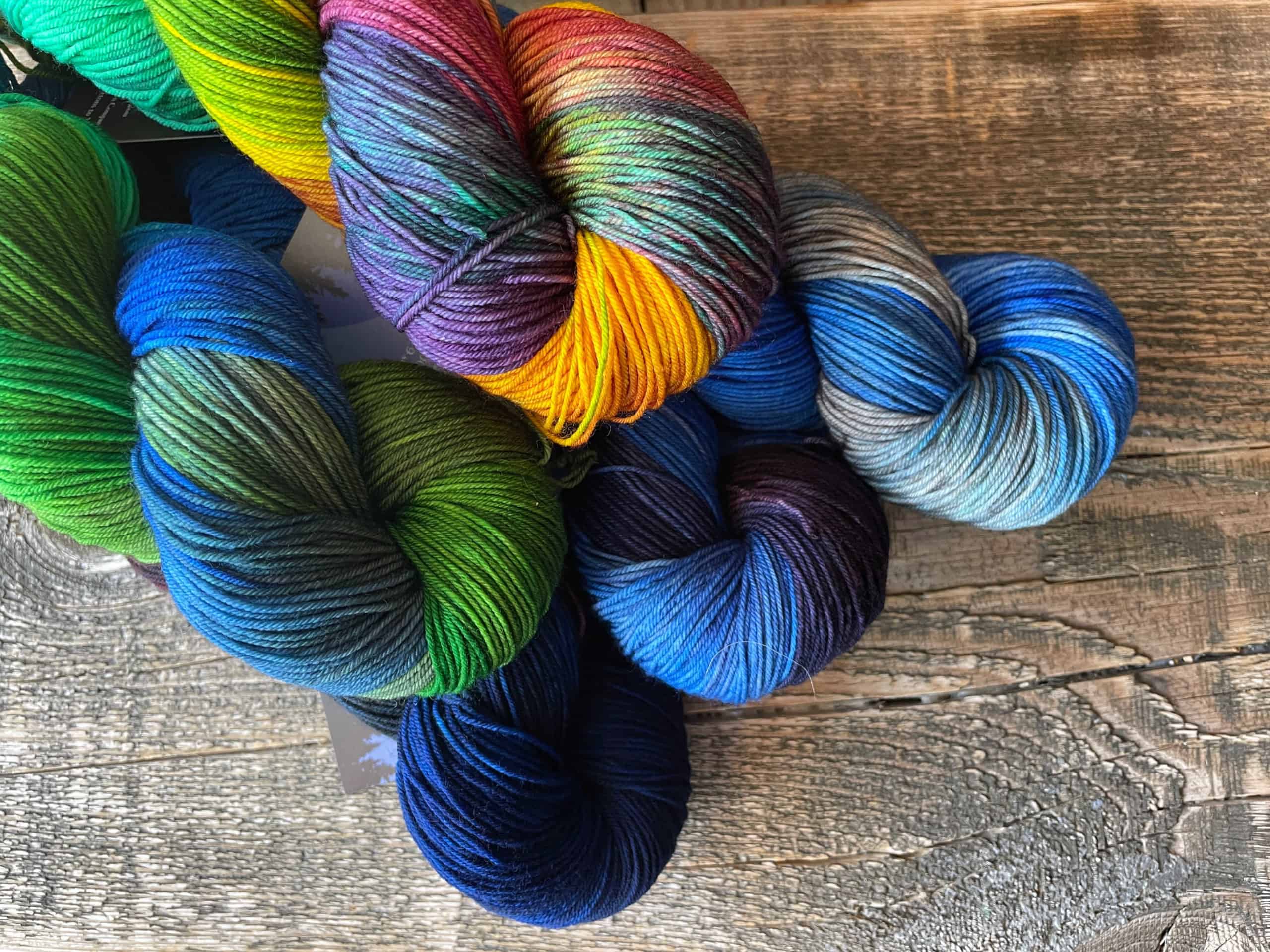 Blue, green and orange hand-dyed yarn.