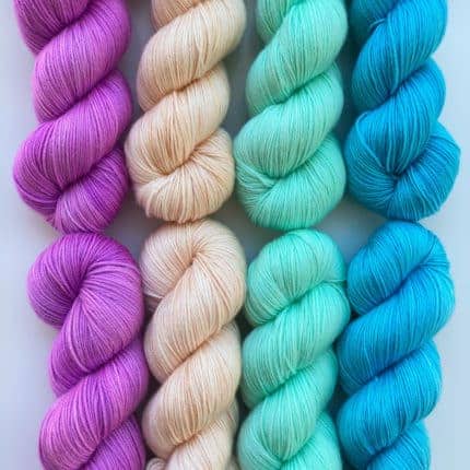 Purple, pink, aqua and blue yarn.