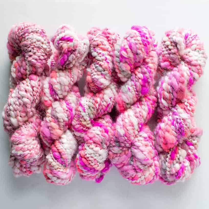 Pink crimped yarn.