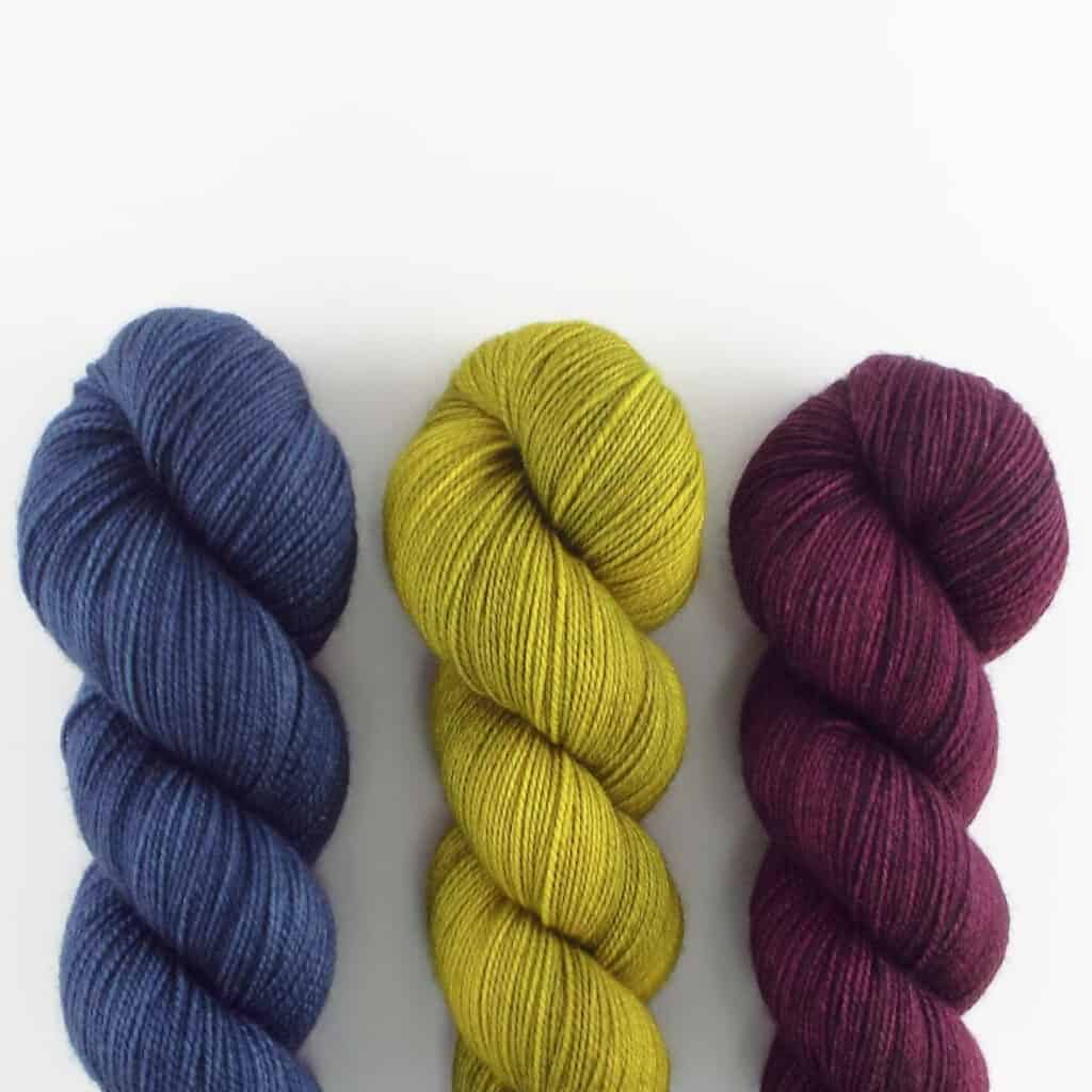 Blue, chartreuse and purple yarn.