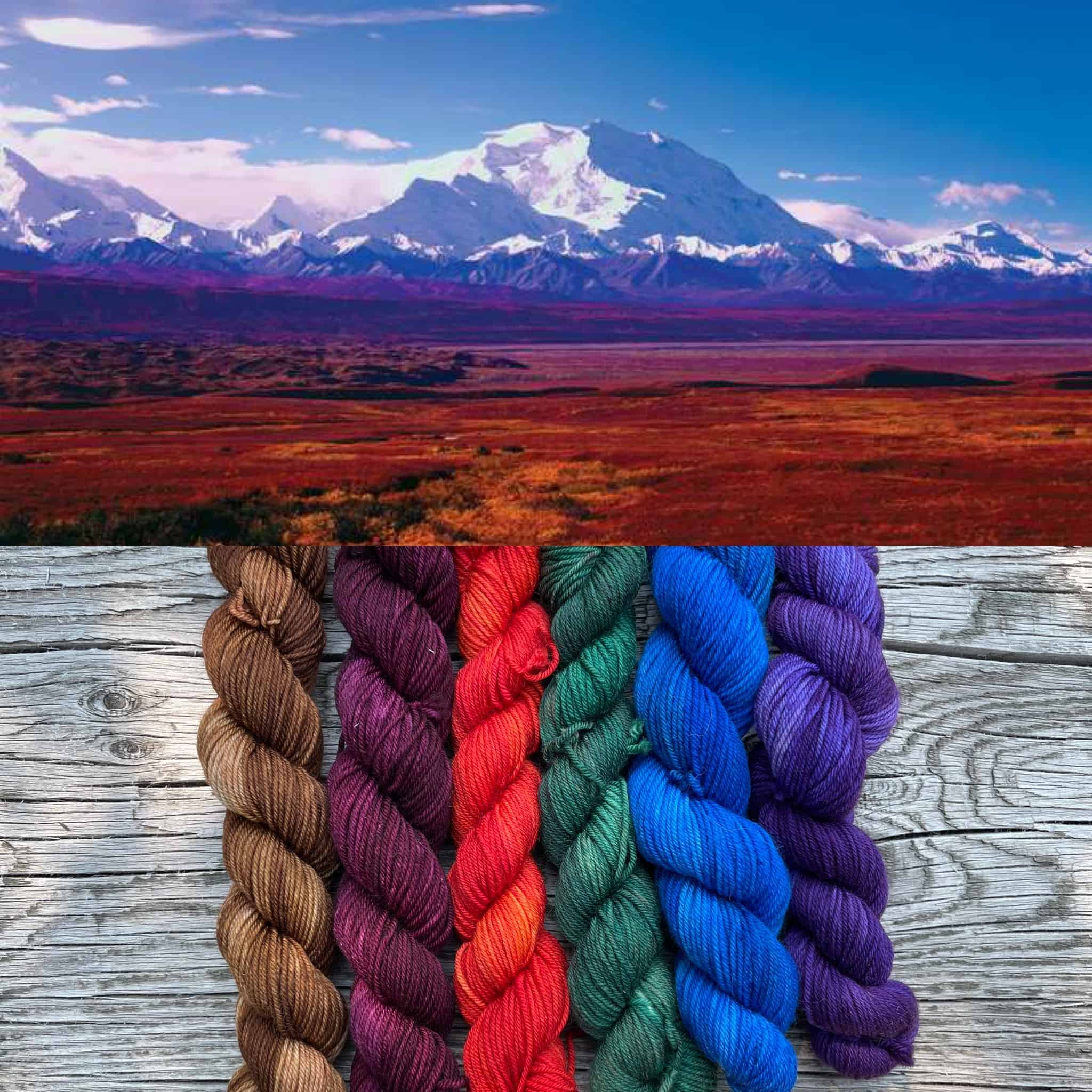 A snow-covered mountain and skeins of brown, plum, red, green, blue and purple yarn.