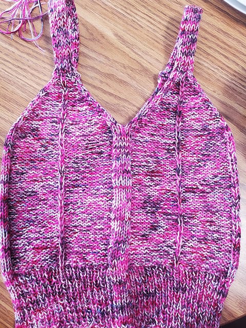 A pink knit tank top.