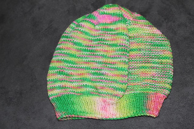 A bright green and pink hat.