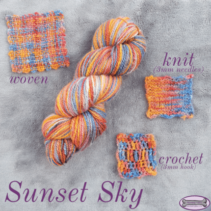 A single skein of yarn in orange, pink, red and blue on a grey background surrounded by a weaving, a knitting and a crochet sample.