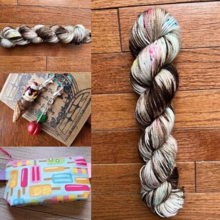 A dark hot fudge splashed skein with bright speckles, a popsicle project bag, a waffle cone ice cream and a cherry charm set.