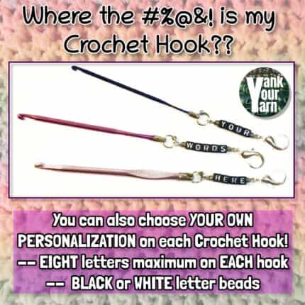 A set of three small crochet hooks on lobster clasps, featuring the words "YOUR", "WORDS", "HERE" in either black or white letter beads, which can be personalized.