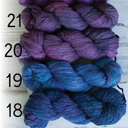 Silk & linen yarn in muted blue and purple colourways, labeled from bottom to top with 18, 19, 20 and 21.