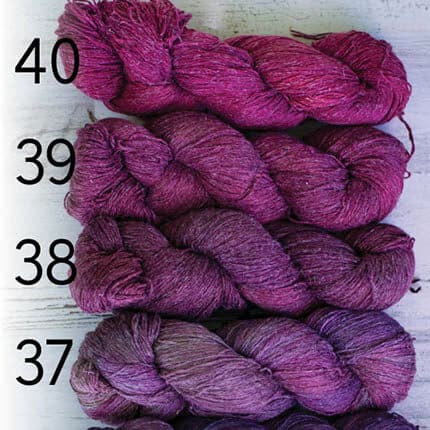 Silk and linen yarn in muted red and maroon colourways, labeled from bottom to top with 37, 38, 39 and 40.