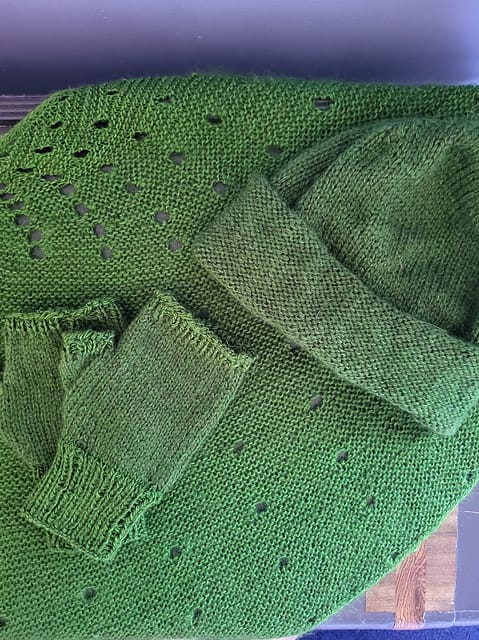 Green knitted items.