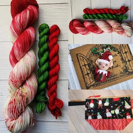 Elf on the WIP themed sock set. Red and green yarn with an elf charm and gnome elf project bag.