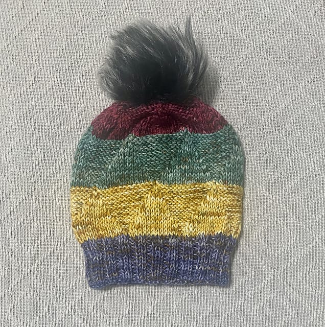 A red, green, yellow and blue hat.