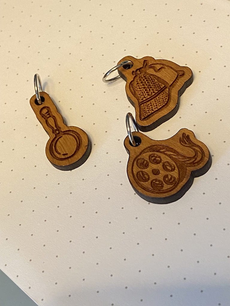 Sherlock Holmes wooden stitch markers.
