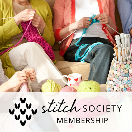 A group of light-skinned women shown from the chest down knitting together with banner that reads Stitch Society Membership.