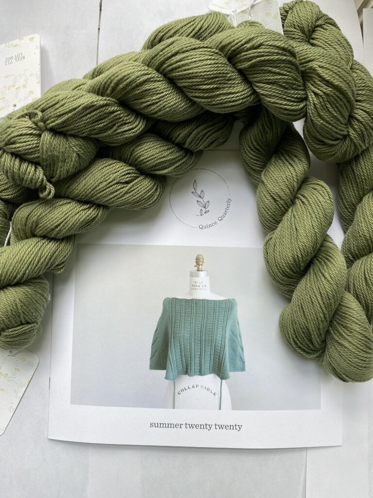 5 skeins of green yarn and capelet pattern.