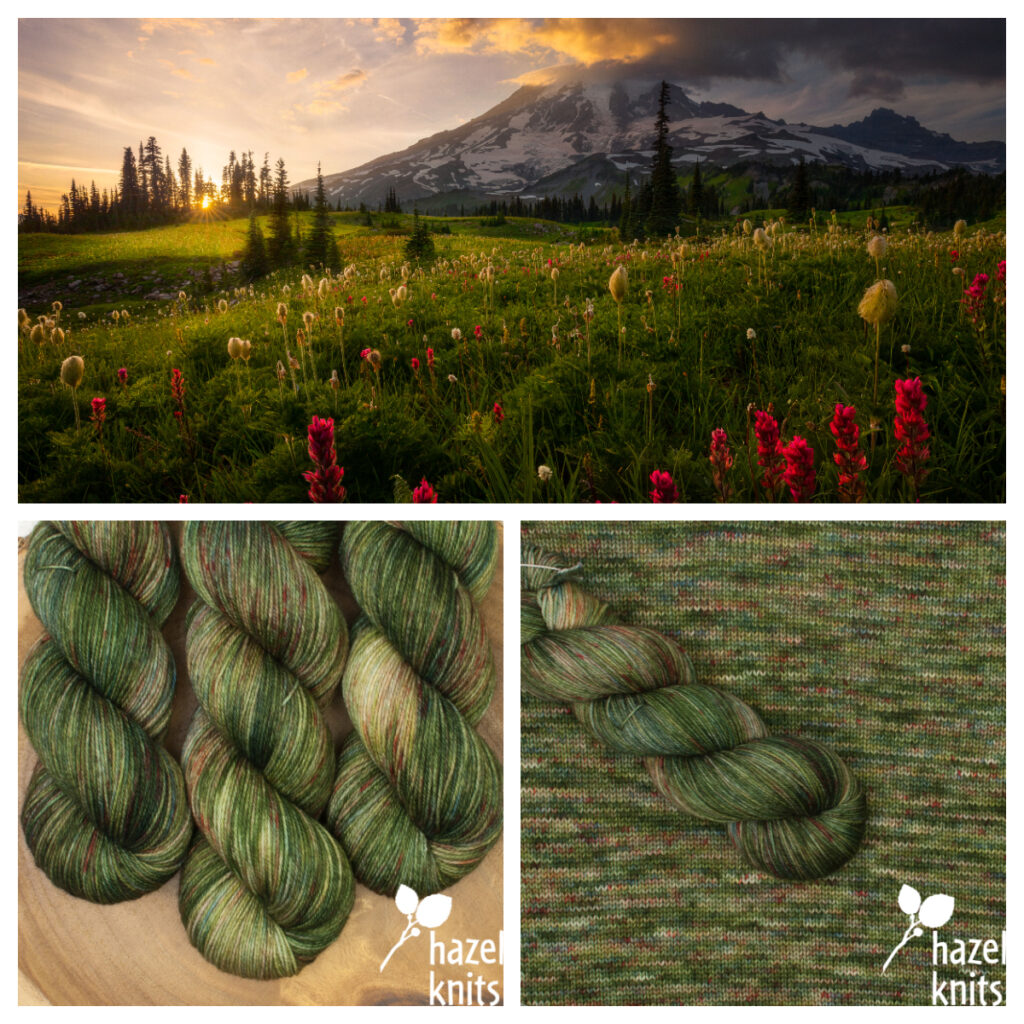 A snow-topped mountain amidst a green field of red and cream flowers, and yarn in similar colors.