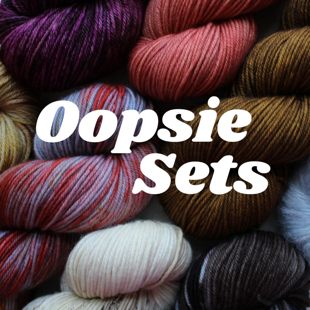 Multiple skeins of yarn in various colors. Text: Oopsie Skeins.
