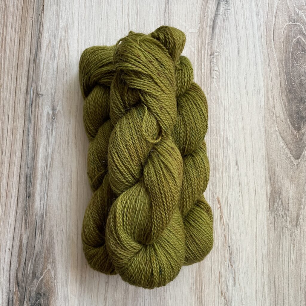 Skeins of green yarn.