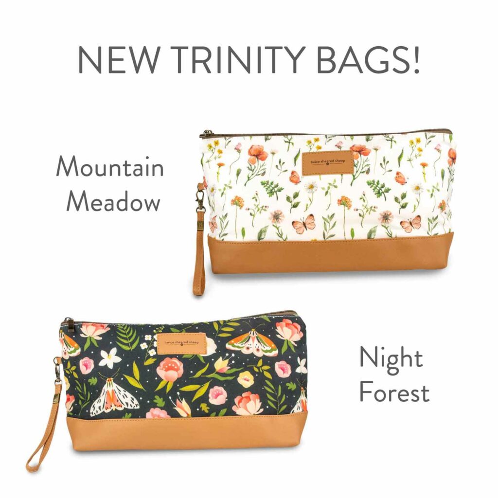 Two floral zipper bags on a white background with the text New Trinity Bags, Mountain Meadow and Night Forest.