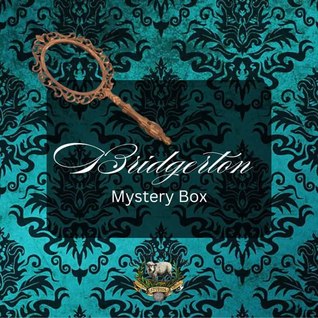 A teal and black lace brocade background with a vintage hand mirror promoting the Olive & Two Ewe Bridgerton Mystery Box.