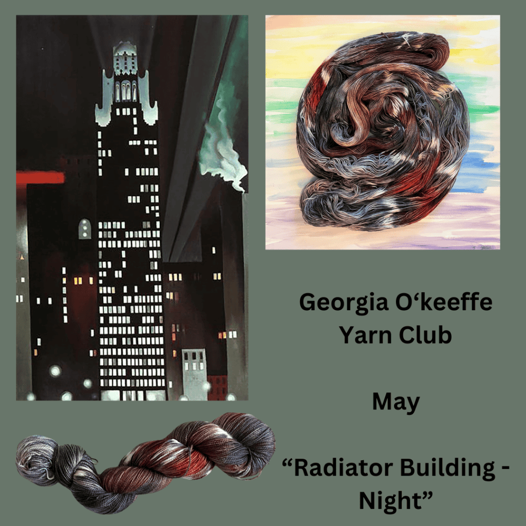 A painting of a city at night paired with black, gray and red yarn.
