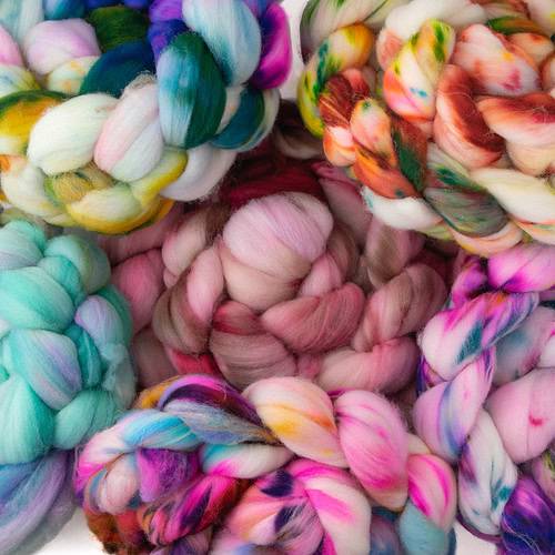 Several braids of brightly-colored fiber.