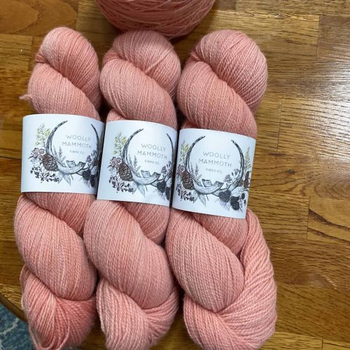 Skeins of pink yarn.