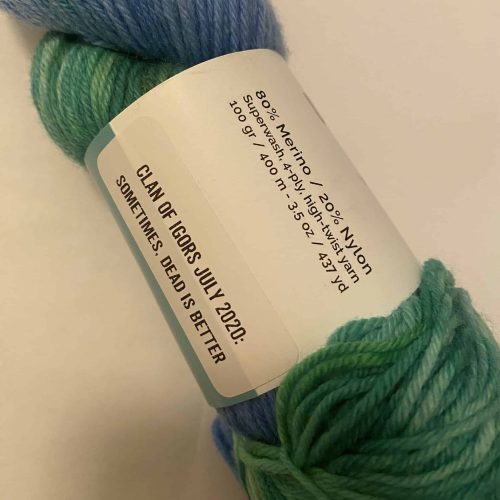 A skein of bright green and blue yarn.