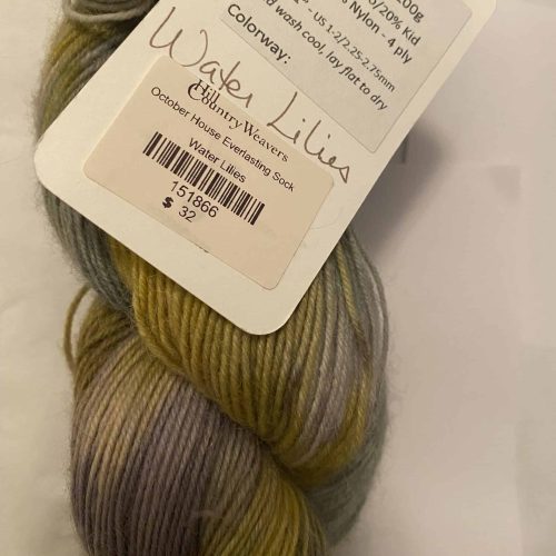 A tag on a skein of gray and yellow variegated yarn.