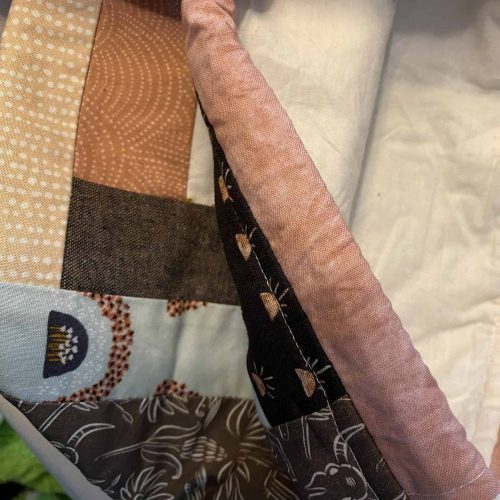 A shawl project bag with desert motifs.