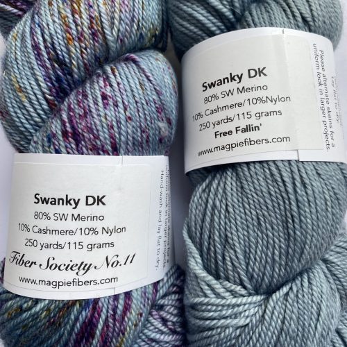 2 skeins of blue, purple and brown yarn.