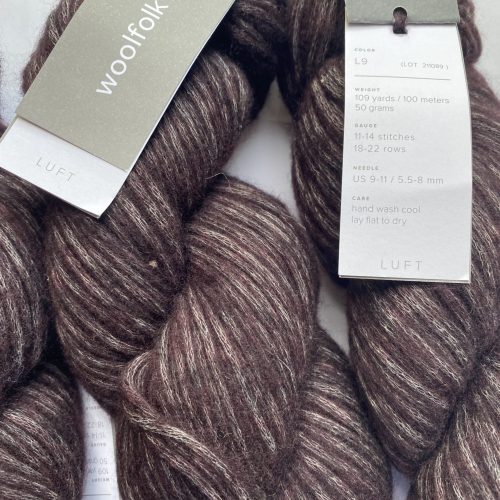 3 skeins brown gray variegated yarn.