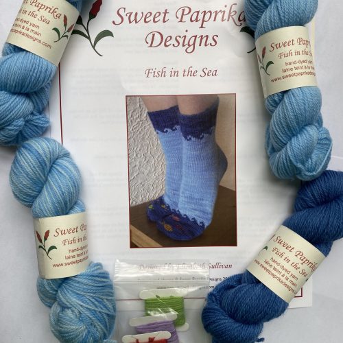 4 skeins blue yarn and sock pattern.