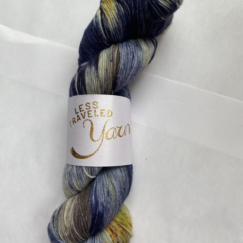 One skein of blue, yellow and green yarn.