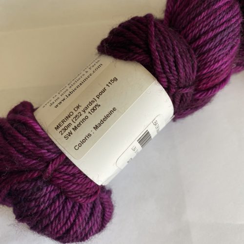 One skein purple yarn.